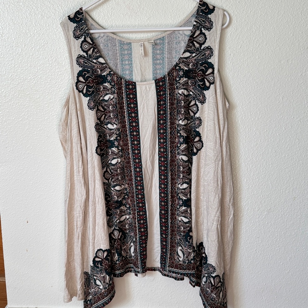 Cato Sleeveless Top with Blue and Cream Patterns